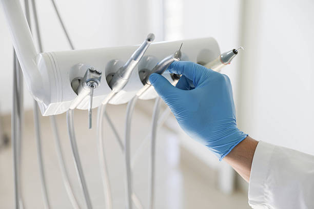 Professional Tooth Extraction technician working in Spout Springs, NC